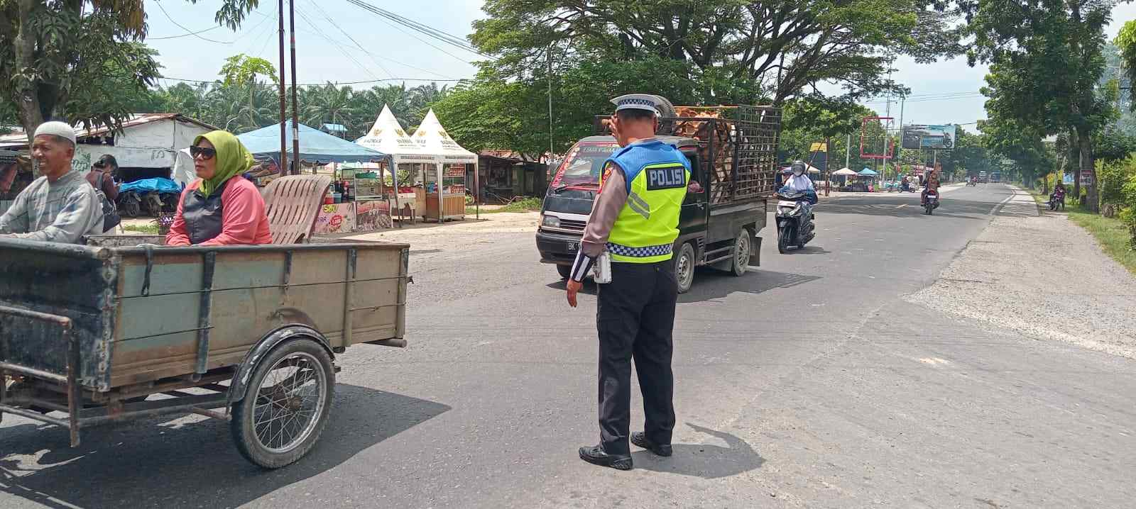 Sat Lantas Polres Batu Bara Lakukan Gatur Sore di Jalinsum Simpang Pos Lantas Sei Bejangkar   