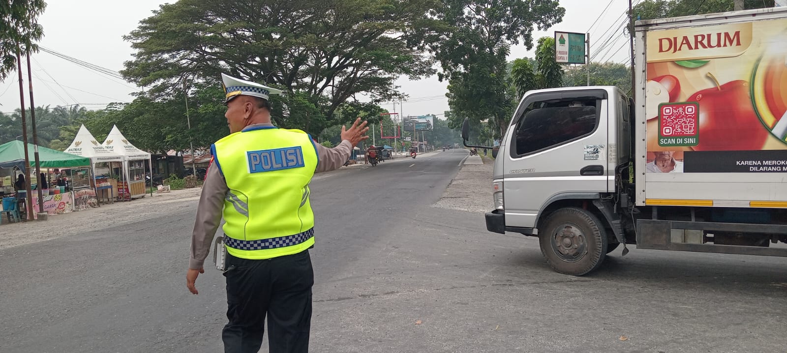 Sat Lantas Polres Batu Bara Laksanakan Pengaturan Lalu Lintas Siang Di Simpang Pos Lantas Sei Bejangkar   