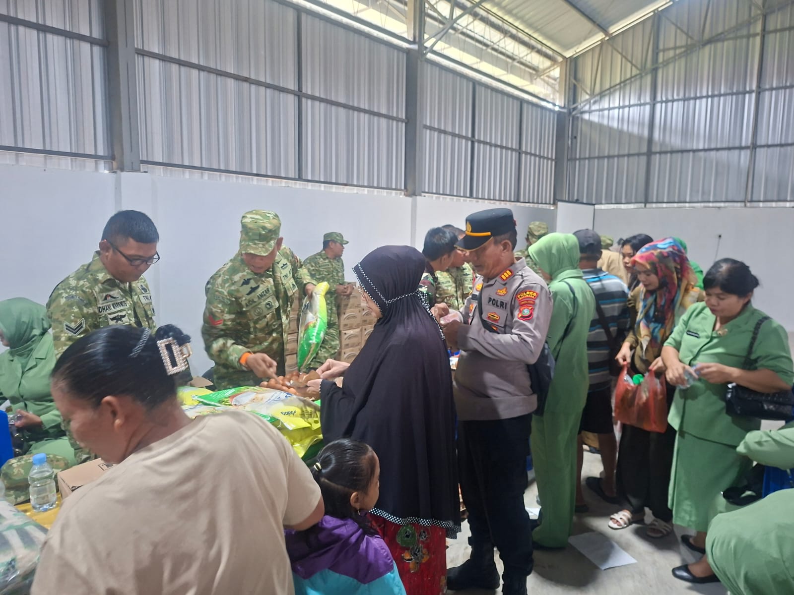 Polsek Talawi Hadiri Bazar Murah Kodim 0208/Asahan Sambut HUT TNI ke-81